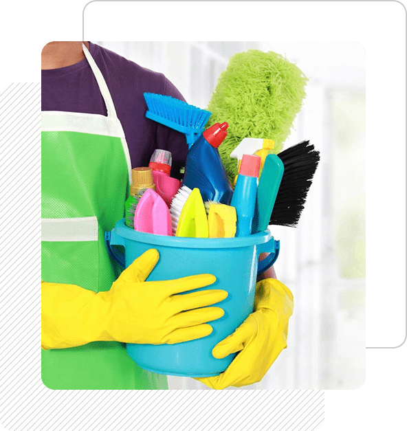A person holding a bucket of cleaning supplies.